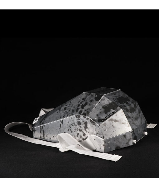 limited edition metal backpack laying flat 2